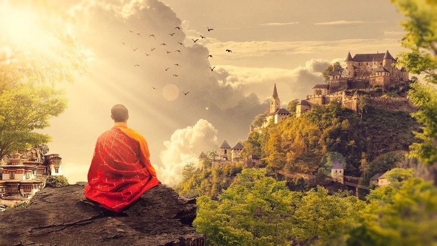 monk watching beautiful landscape